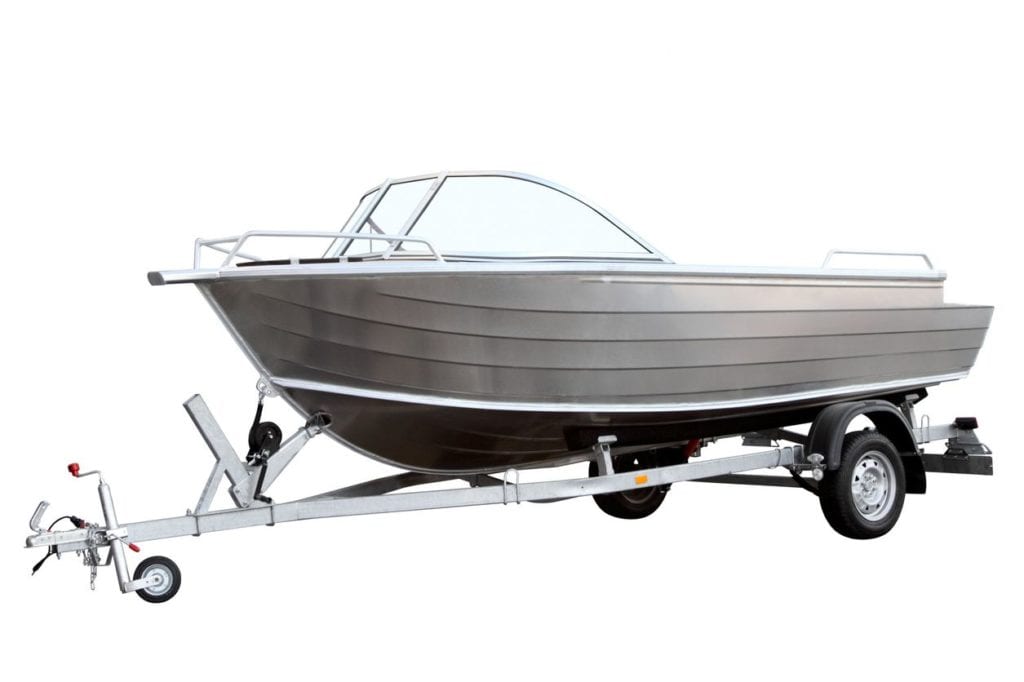 Aluminum runabout boat on trailer